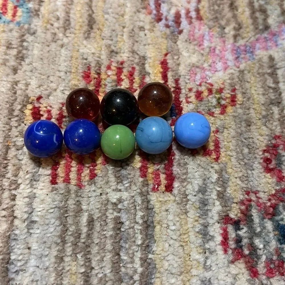 Vintage marbles, solid and clear from cobalt to jade to orange in color eight pi